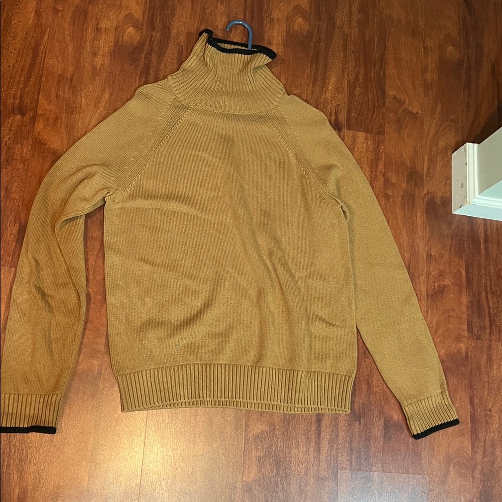 size medium banana republic tan turtle neck sweater with black details